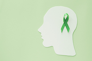 mental health awareness ribbon in a head